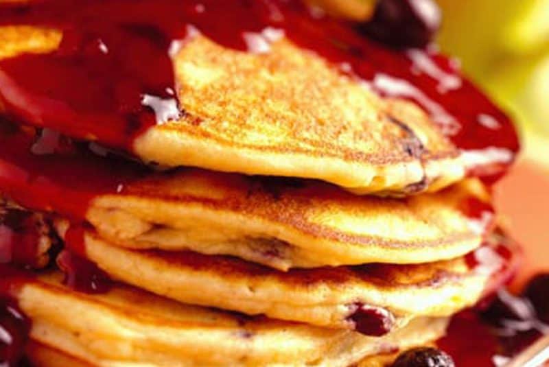 Fluffy Blueberry Pancakes with blueberry ginger sauce.